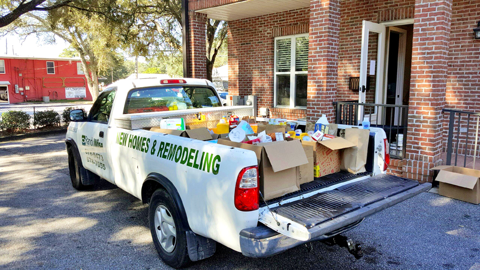 Randy Wise New homes truck delivering donations and supplies