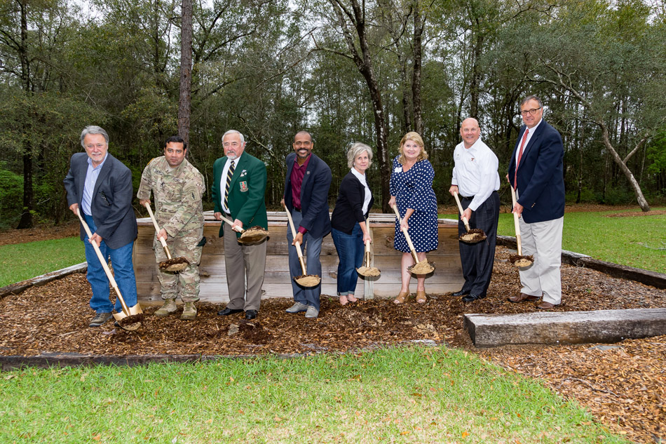 Randy and Debbie Wise along with members of The Special Forces Association Chapter 7, the Taylor Haugen Foundation and United Bank, breaking ground on a new Community Sprit Home site.